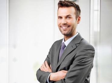Man in business suit smiling